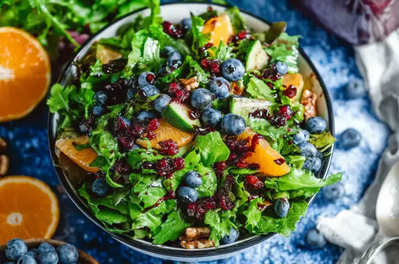 A delicious plate of Cranberry Blueberry Salad with Blueberry Balsamic Dressing