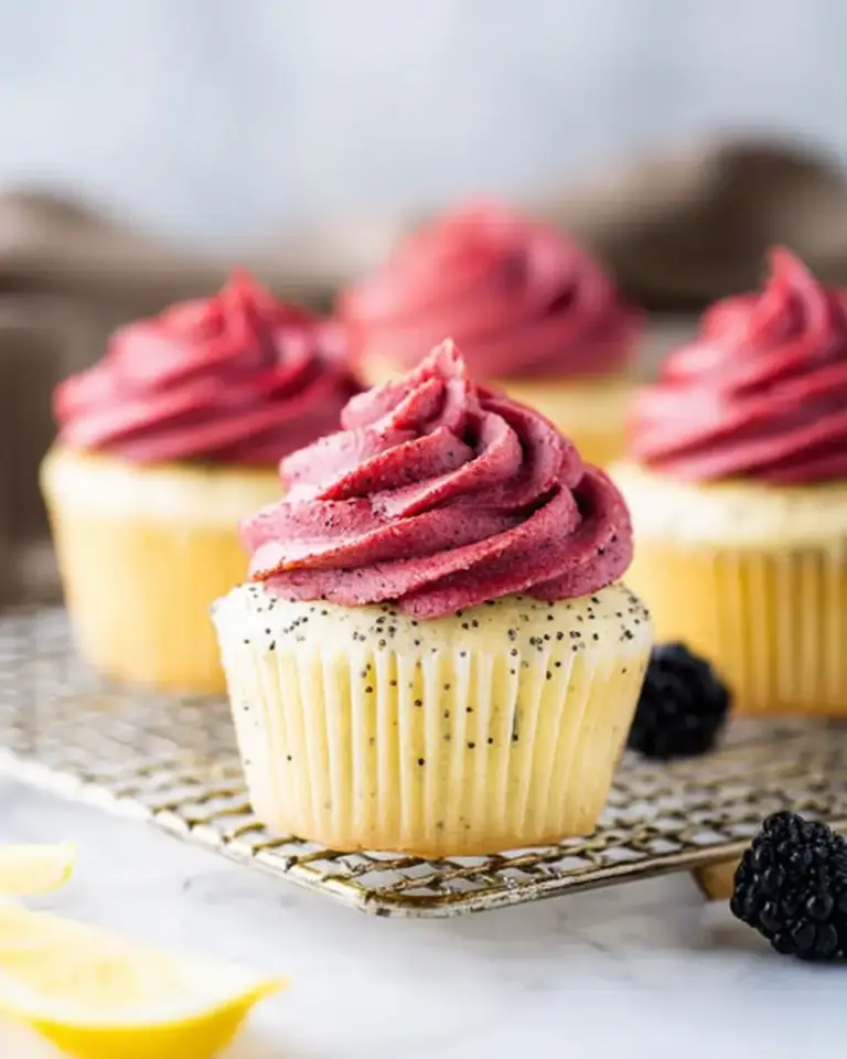 A delicious plate of Lemon Poppy Seed Cupcakes