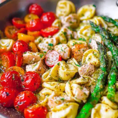 A delicious plate of Pesto Chicken Tortellini and Veggies