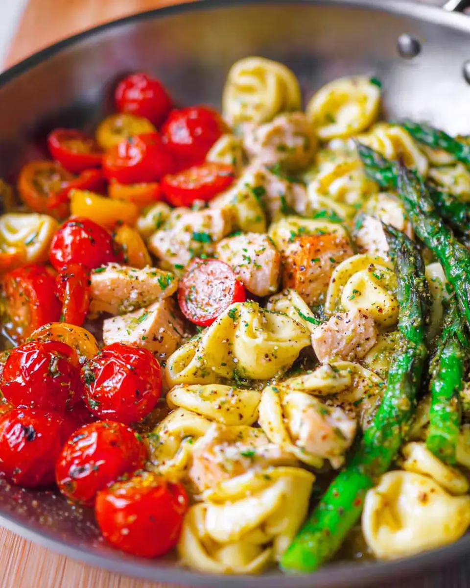 A delicious plate of Pesto Chicken Tortellini and Veggies